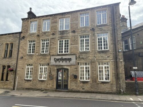 Cardamon Indian restaurant on Albert Street in Hebden Bridge, where Beth and Kitty share a meal in Riot Women