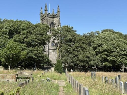 Heptonstall graveyard and church tower above Hebden Bridge, where Becky Cawood's grave is filmed in Happy Valley