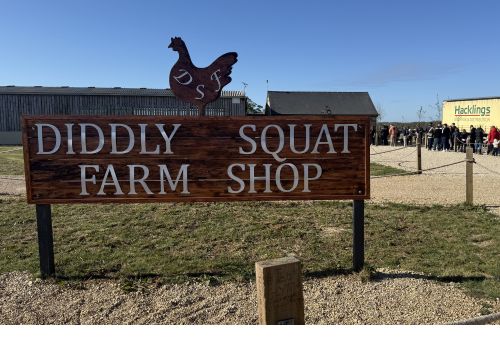 Diddly Squat Farm Shop sign in the Cotswolds from Clarkson’s Farm