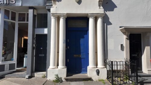 The famous blue door from Notting Hill on Westbourne Park Road in London