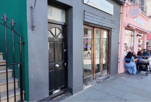 Doorway on Westbourne Park Road featured in the orange juice scene from Notting Hill